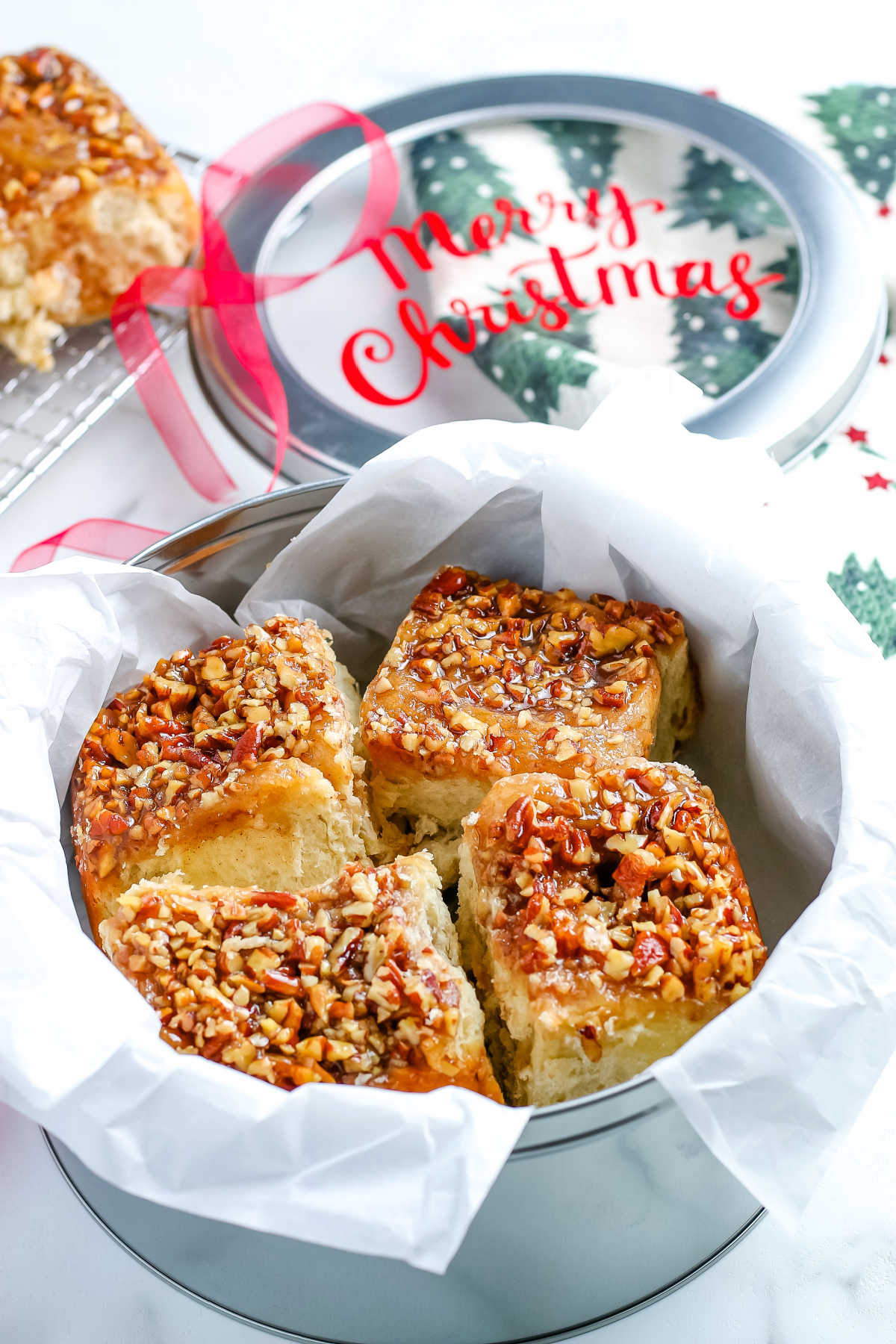 The finished pecan sticky buns recipe in a tin for gifting. 