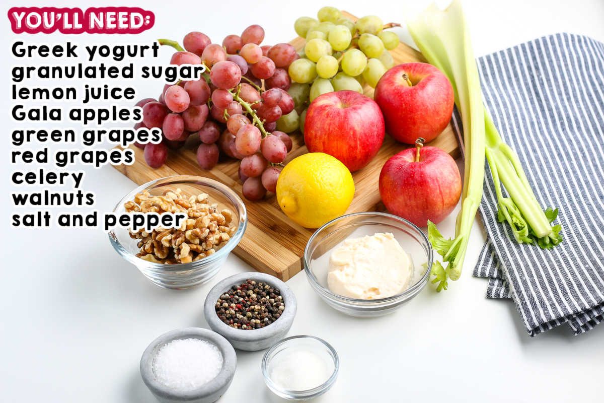 All of the ingredients needed to make Waldorf Salad.