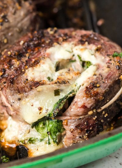 A close up picture of the finished Flank Steak Pinwheels in a pan.