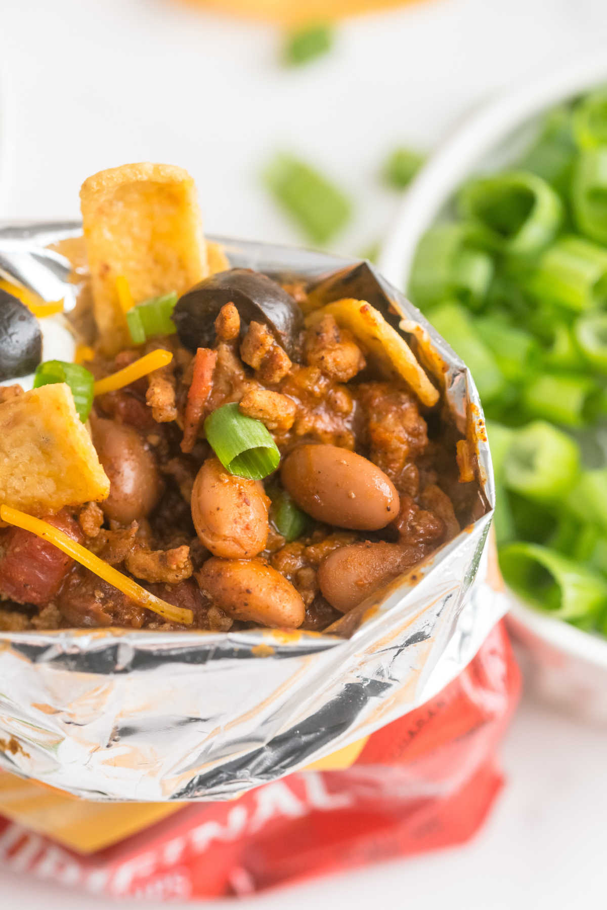 A close up picture of the finished walking Frito pie.