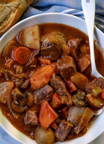 An overhead picture of the finished Gone All Day Stew in a white bowl.