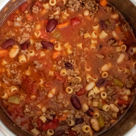 An overhead picture of Olive Garden Pasta e Fagioli Soup.