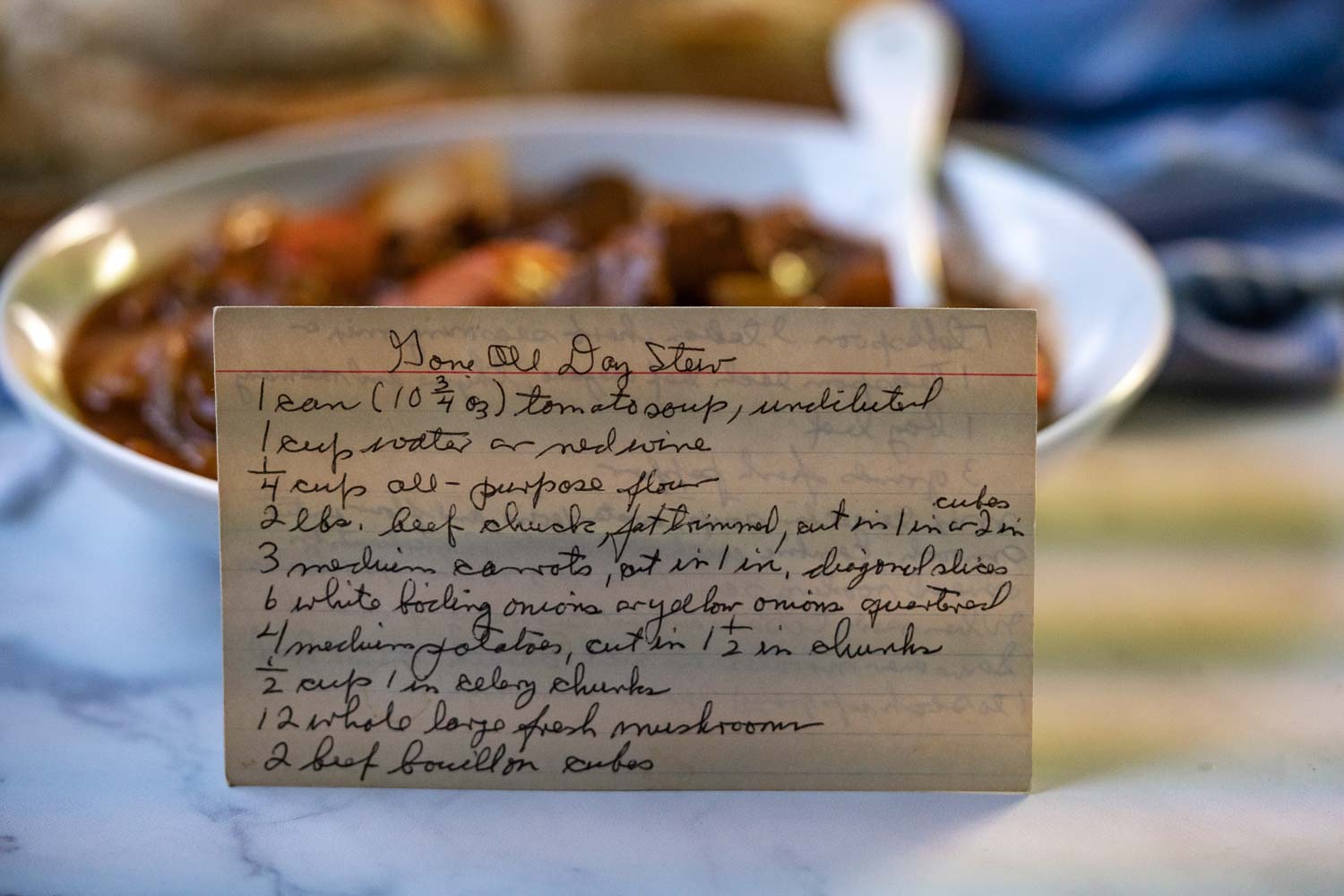 A picture of Papa's recipe card of Gone All Day Stew written in his hand writing.