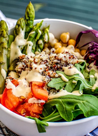 A close up picture of a finished Buddha Bowl with Tahini Dressing.