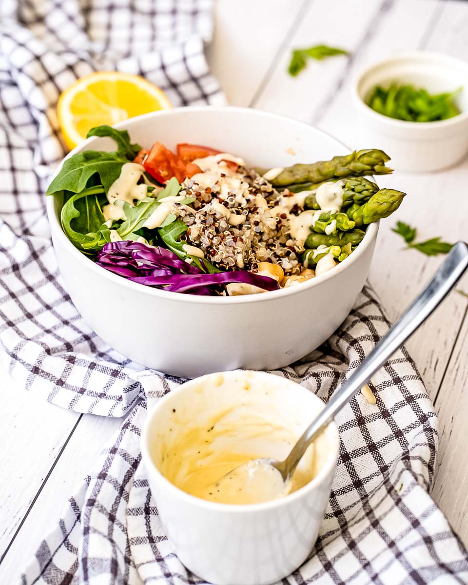 A close up picture of the finished Buddha Bowls Dressing made with tahini and lemon.