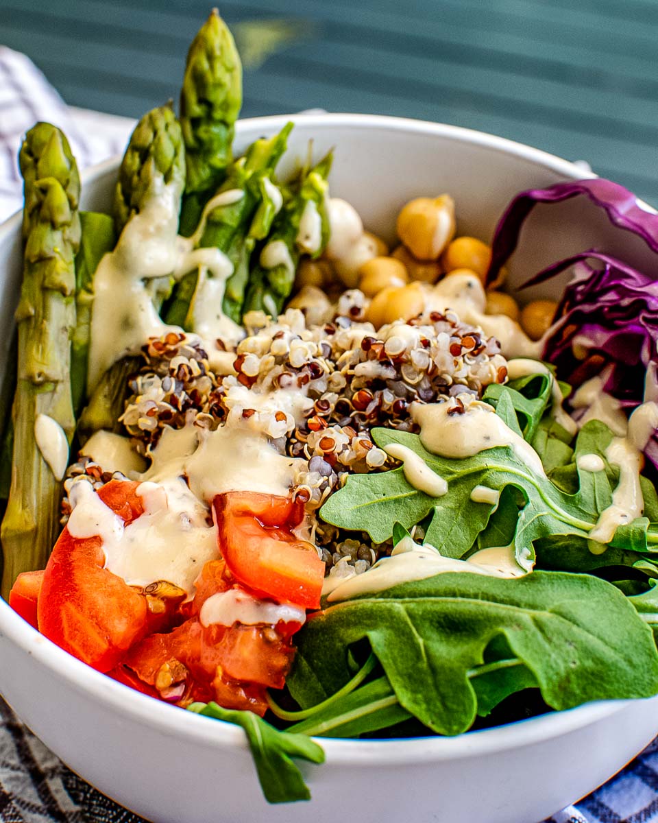 A close up picture of a finished Buddha Bowl with Tahini Dressing. 