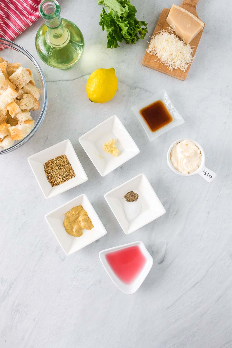 All of the ingredients needed to make this Caesar Salad and Caesar Salad Dressing without anchovies.