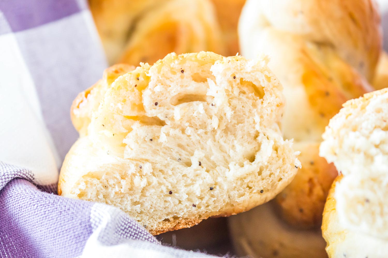 A close up picture of an Easter Dinner Roll cut into.