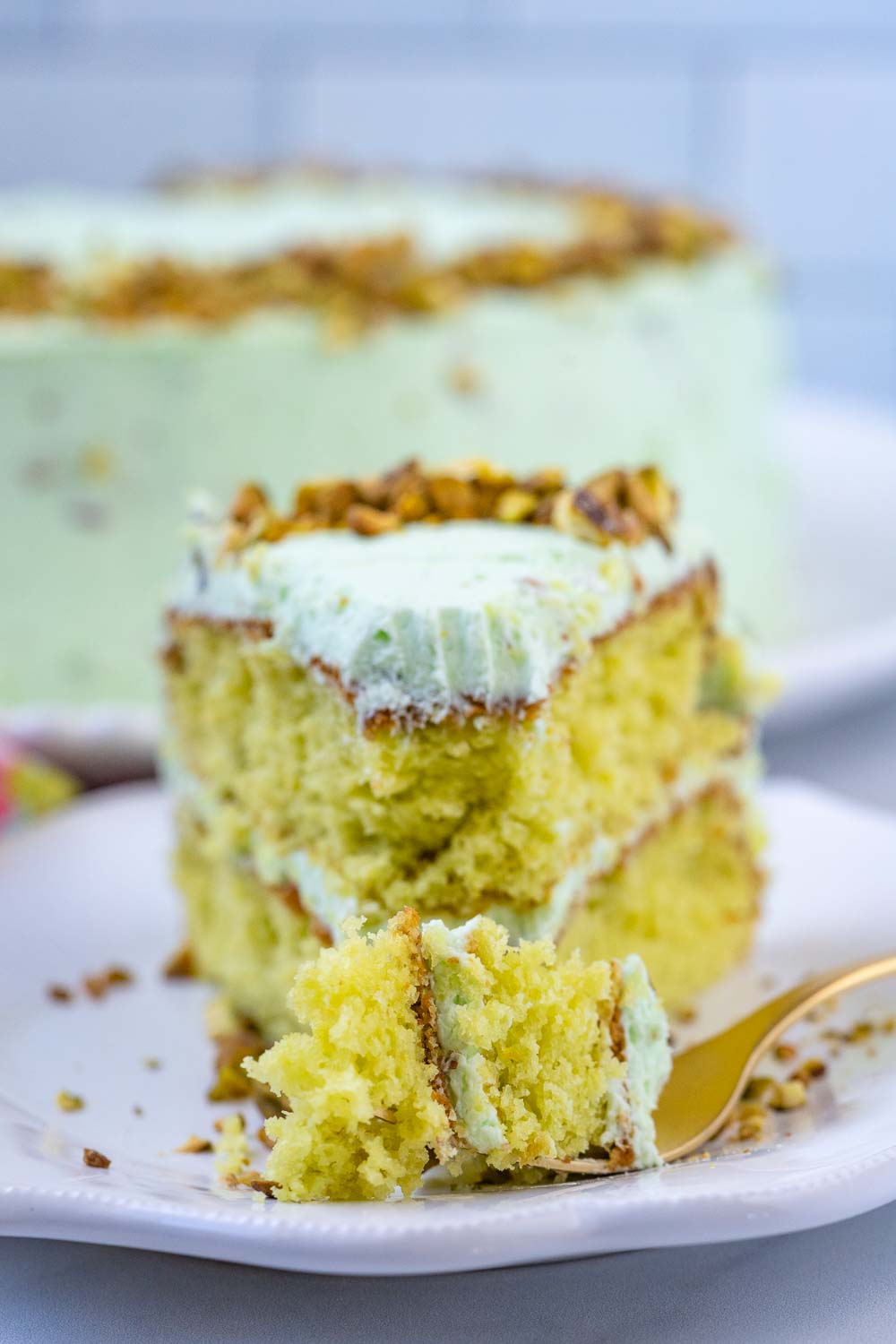 A for digging into a slice of pistachio cake.
