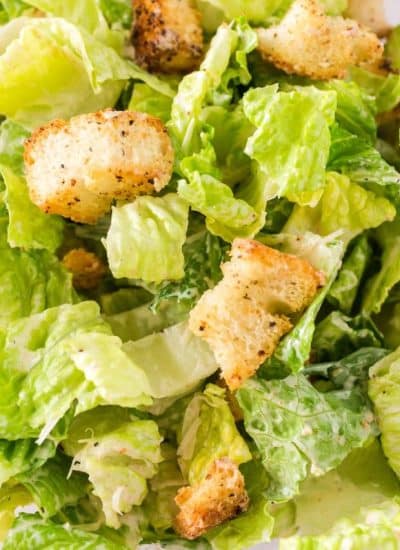 A close up overhead picture of the finished Caesar Salad.