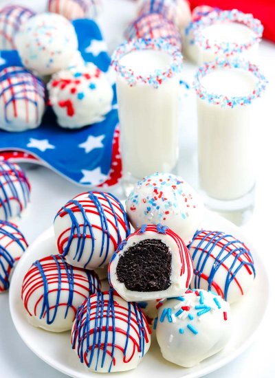 A plate stacked with Oreo cream cheese truffles.