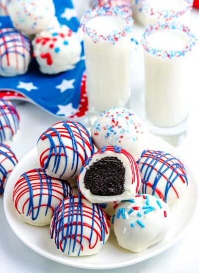 A plate stacked with Oreo cream cheese truffles.