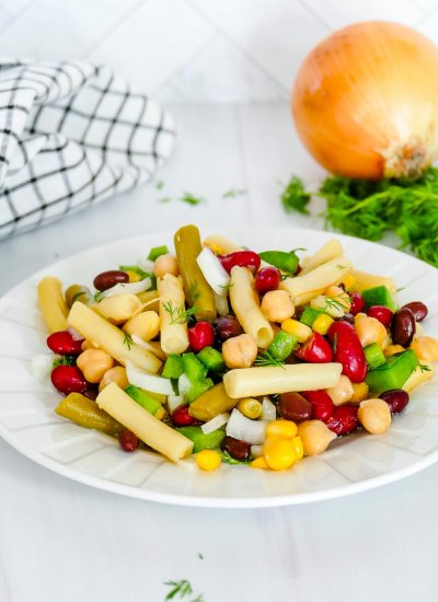 5 Bean Salad on a white plate.