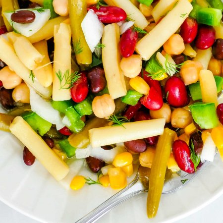 5 Bean Salad on a white plate.