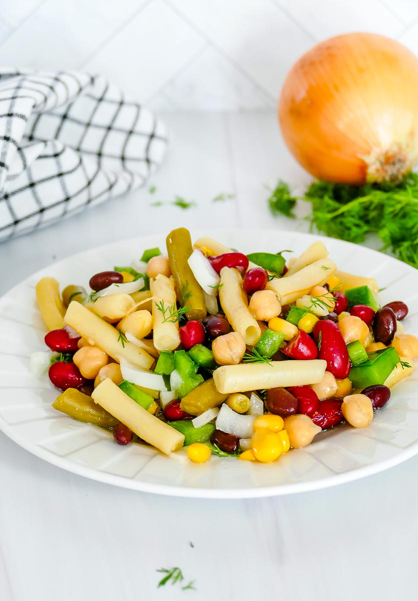 5 Bean Salad on a white plate. 