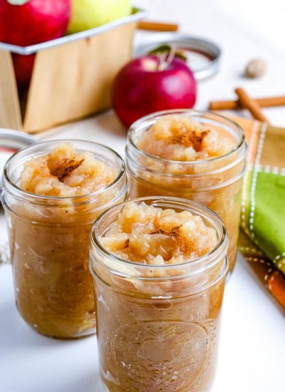 A close up picture of applesauce in canning jars.
