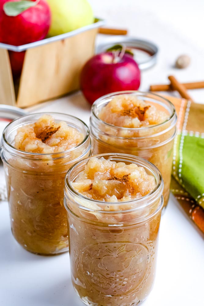 A close up picture of applesauce in canning jars. 