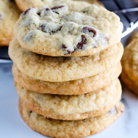 A stack of the finished chocolate chip cookies.