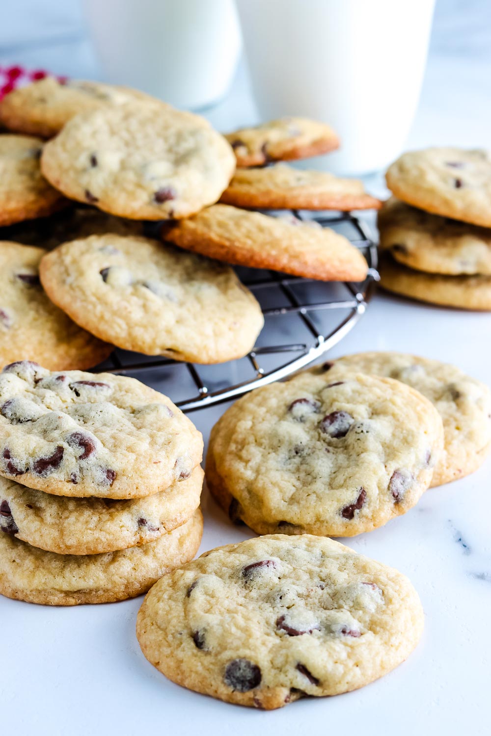 The finished Copycat Mrs. Field's Chocolate Chip Cookies on a cooling rack.