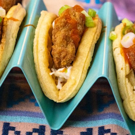 A close up picture of the finished Chicken and Waffle Tacos.