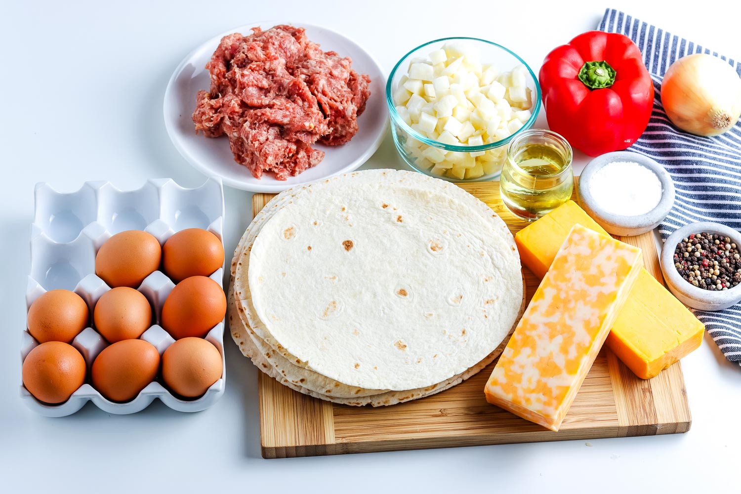 All of the ingredients needed to make this Breakfast Burrito recipe.