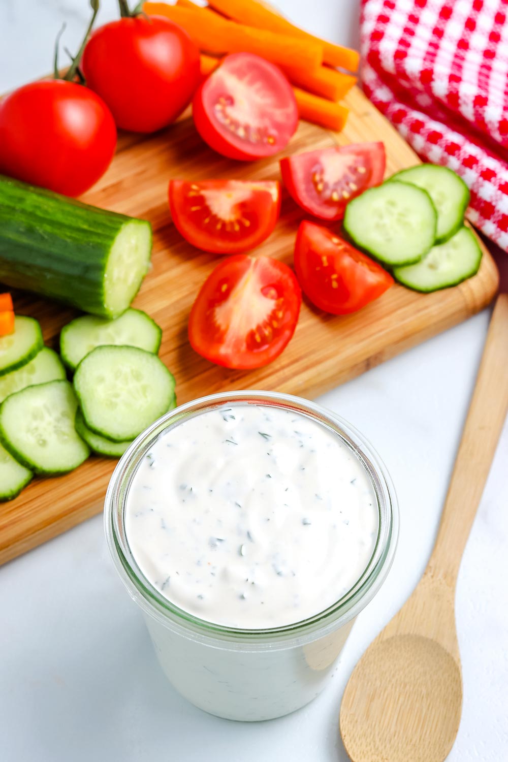 An overhead picture of a jar full of Homemade Ranch Dressing.