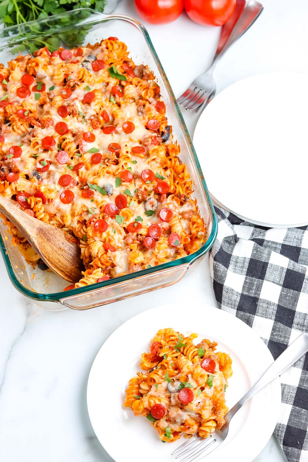 An overhead picture of some of the pizza casserole on a white plate.