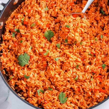 An overhead picture of the finished Spanish Rice recipe in a big pan.