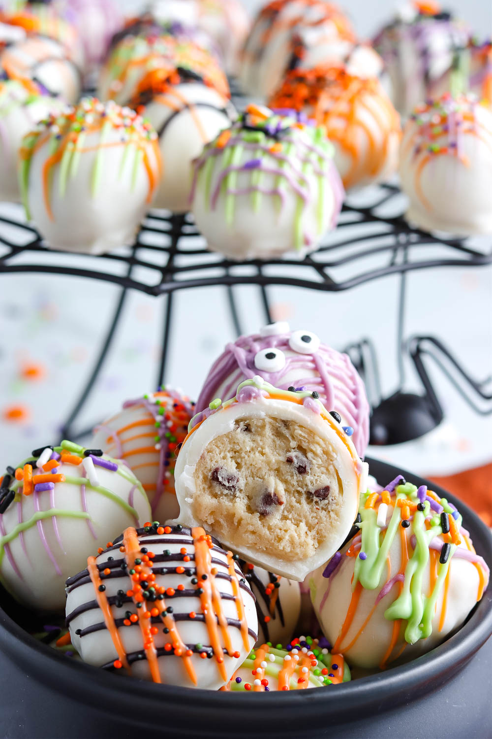 A Cookie Dough Ball bitten into so you can see what it looks like on the inside.