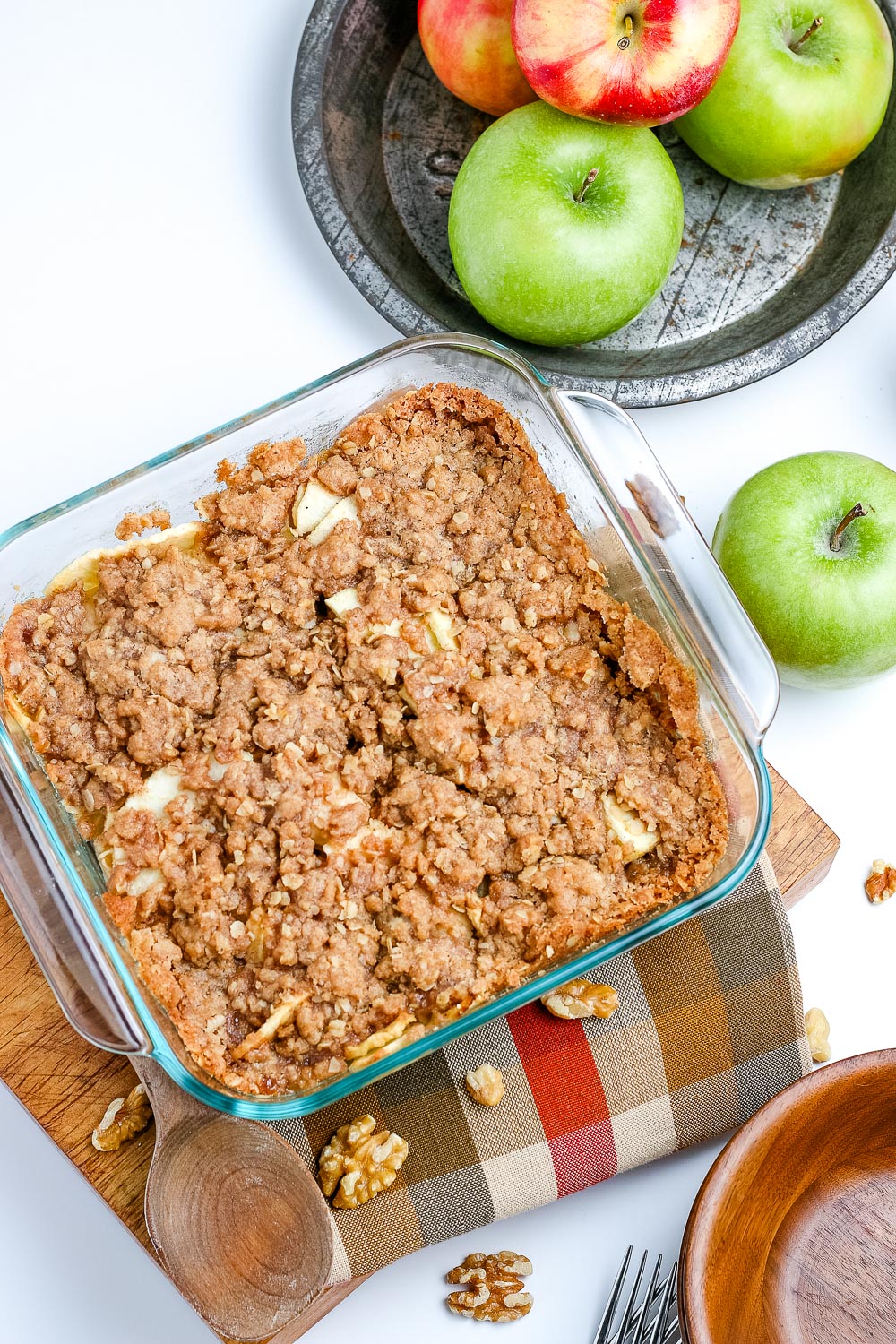 An overhead picture of the finished apple crisp recipe with oats in a baking dish.