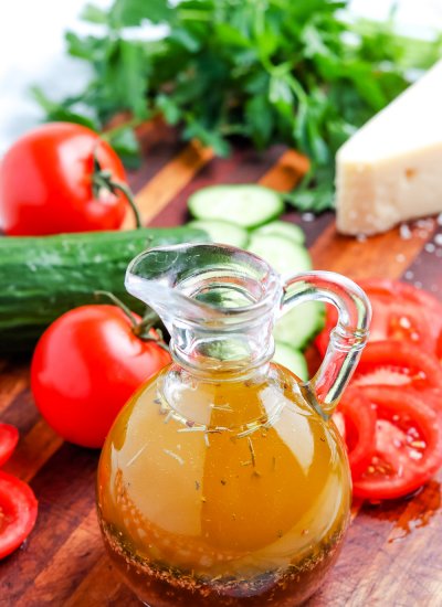 Homemade Italian Dressing in a glass serving bottle.