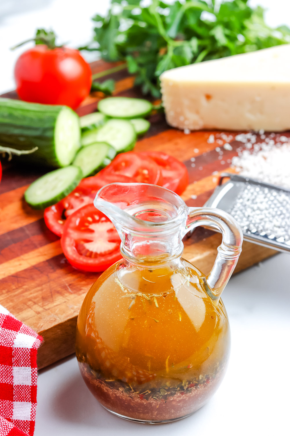 Homemade Italian Dressing in a glass serving bottle.