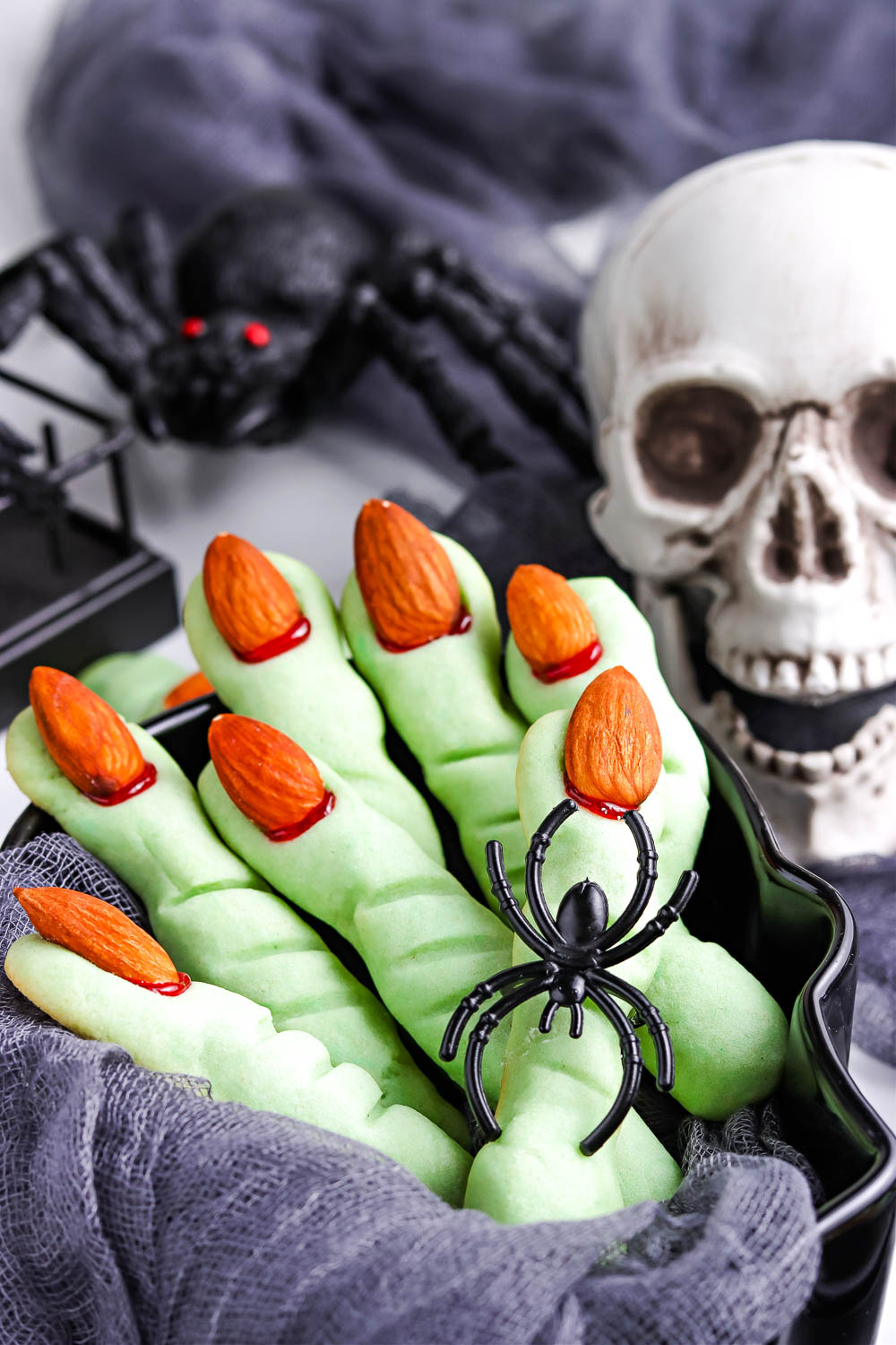 A close up picture of the finished Witch Finger Cookies in a serving bowl. 
