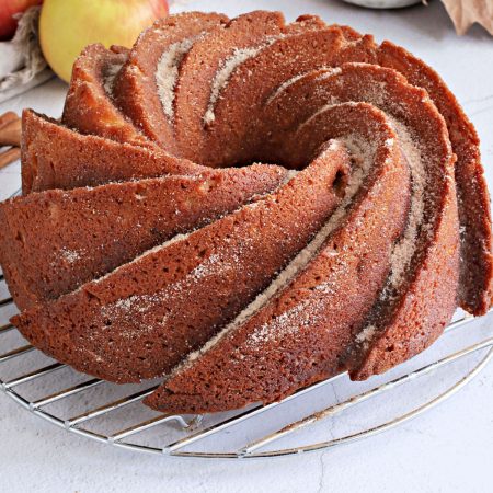 The finished Apple Cider Donut Cake on a wire rack.