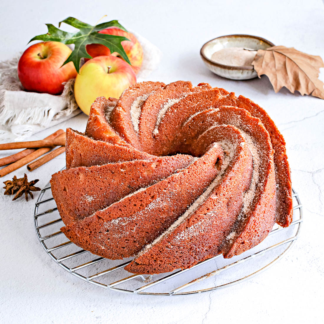 The finished Apple Cider Donut Cake on a wire rack.