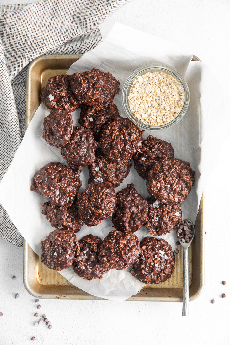 An overhead picture of the finished No-Bake Chocolate Oat Cookies on a baking sheet.
