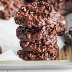 A close up cite of a stack of three No-Bake Chocolate Oat Cookies.