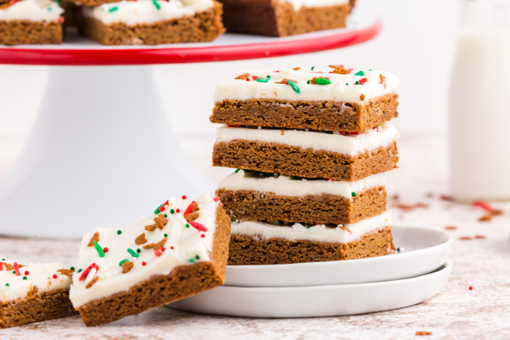 Gingerbread bars stacked on top of each other and one leaning against the stack.