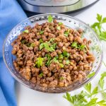 The finished Instant Pot Lentils in a clear glass bowl.