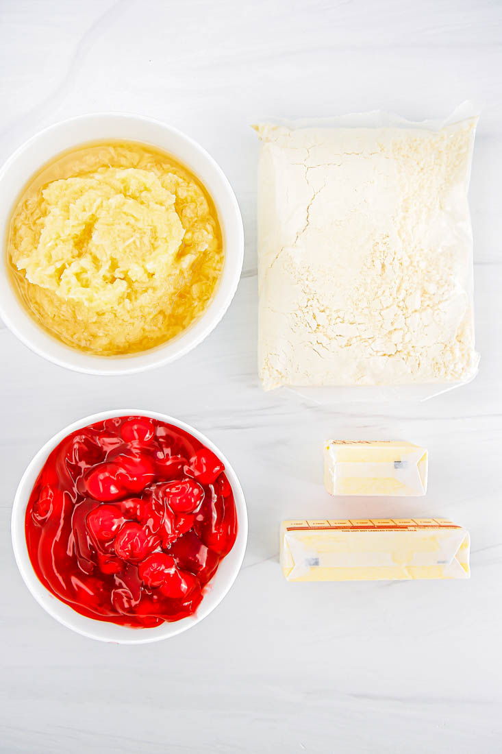 An overhead picture of all of the ingredients needed to make this Cherry Pineapple Dump Cake recipe.