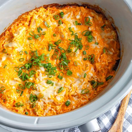 A close up picture of the finished Crockpot Buffalo Chicken Dip in the Crockpot.