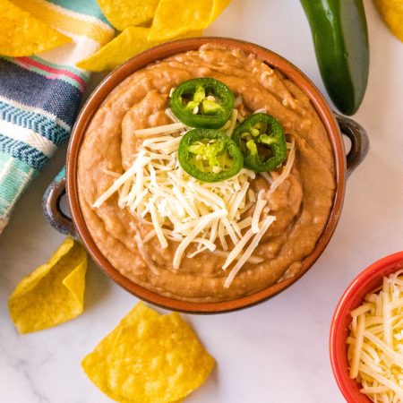 An overhead picture of the finished canned refried beans made better.