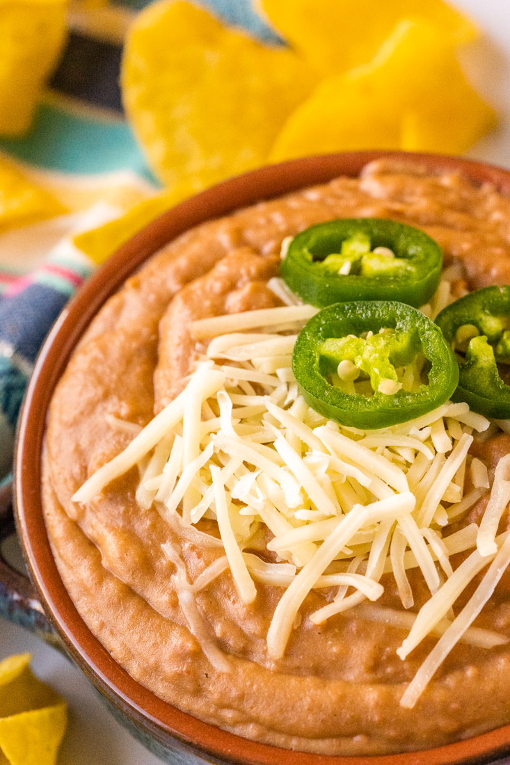 An overhead picture of the finished canned refried beans made better.