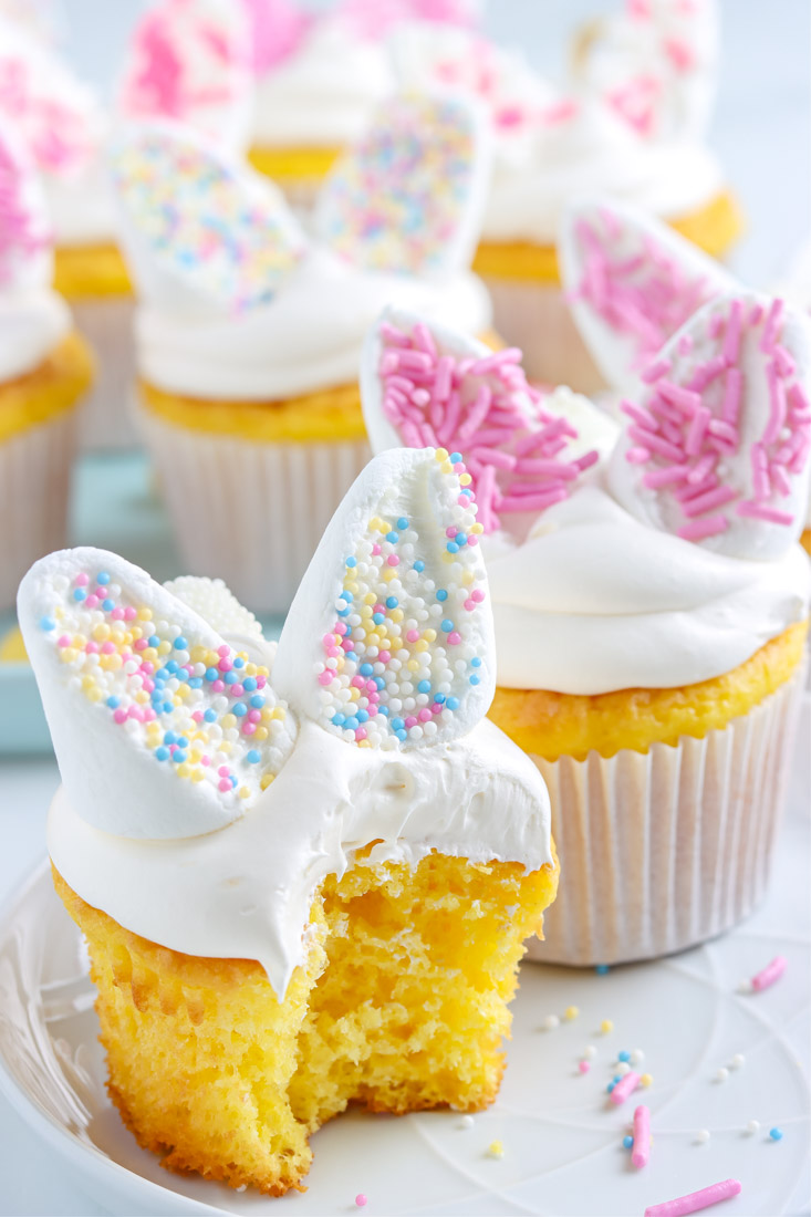A close up picture of the finished Cute Bunny Cupcakes with a bite taken out of one.