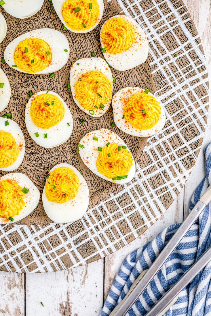 An overhead picture of deviled eggs with horseradish in them.