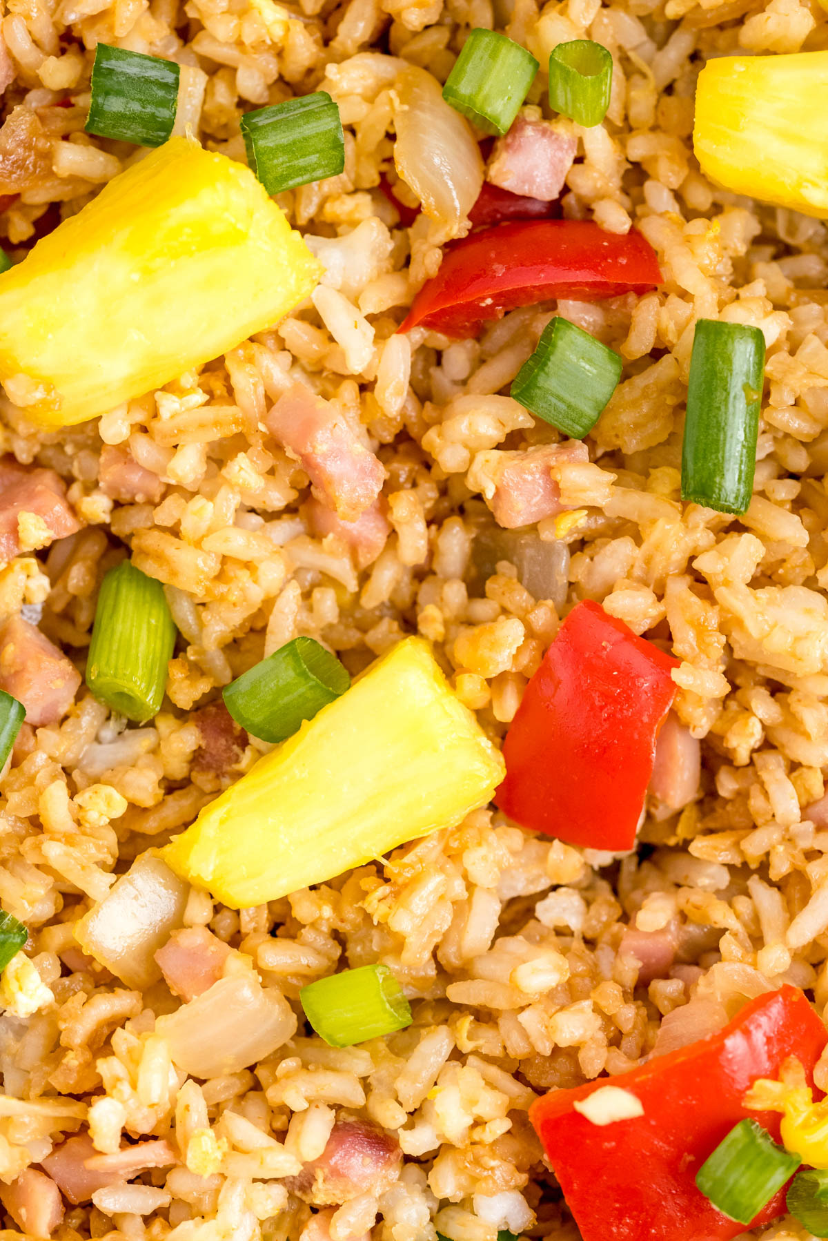 A close up picture of the finished fried rice with pineapple.