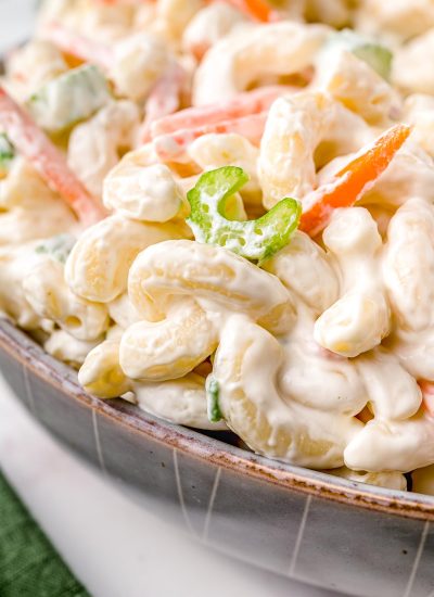 A close up picture of the finished Hawaiian Macaroni Salad in a wooden bowl.