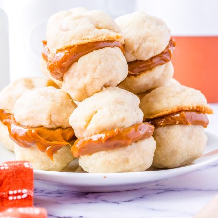 A close up picture of the finished Dulce De Leche Cookies recipe on a white platter.