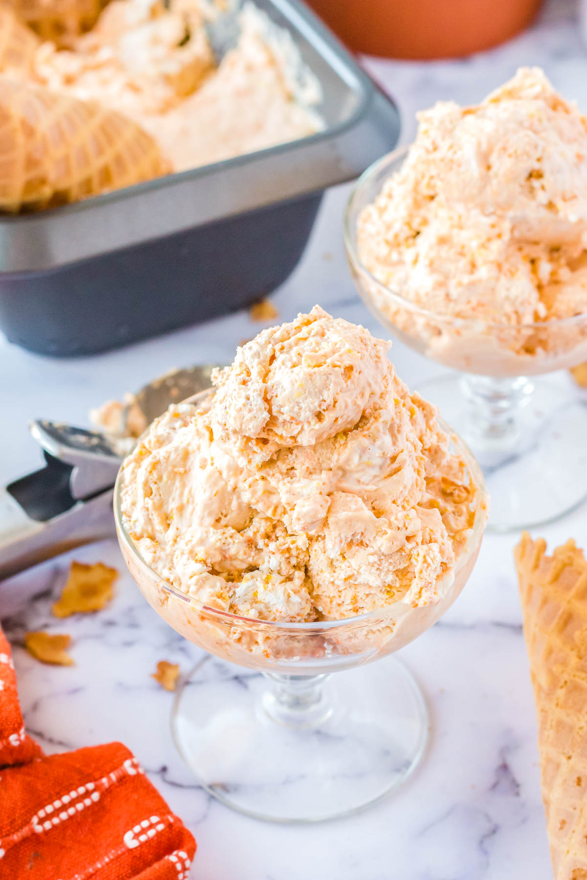 The finished recipe for Butterscotch Ice Cream in glass serving bowls.