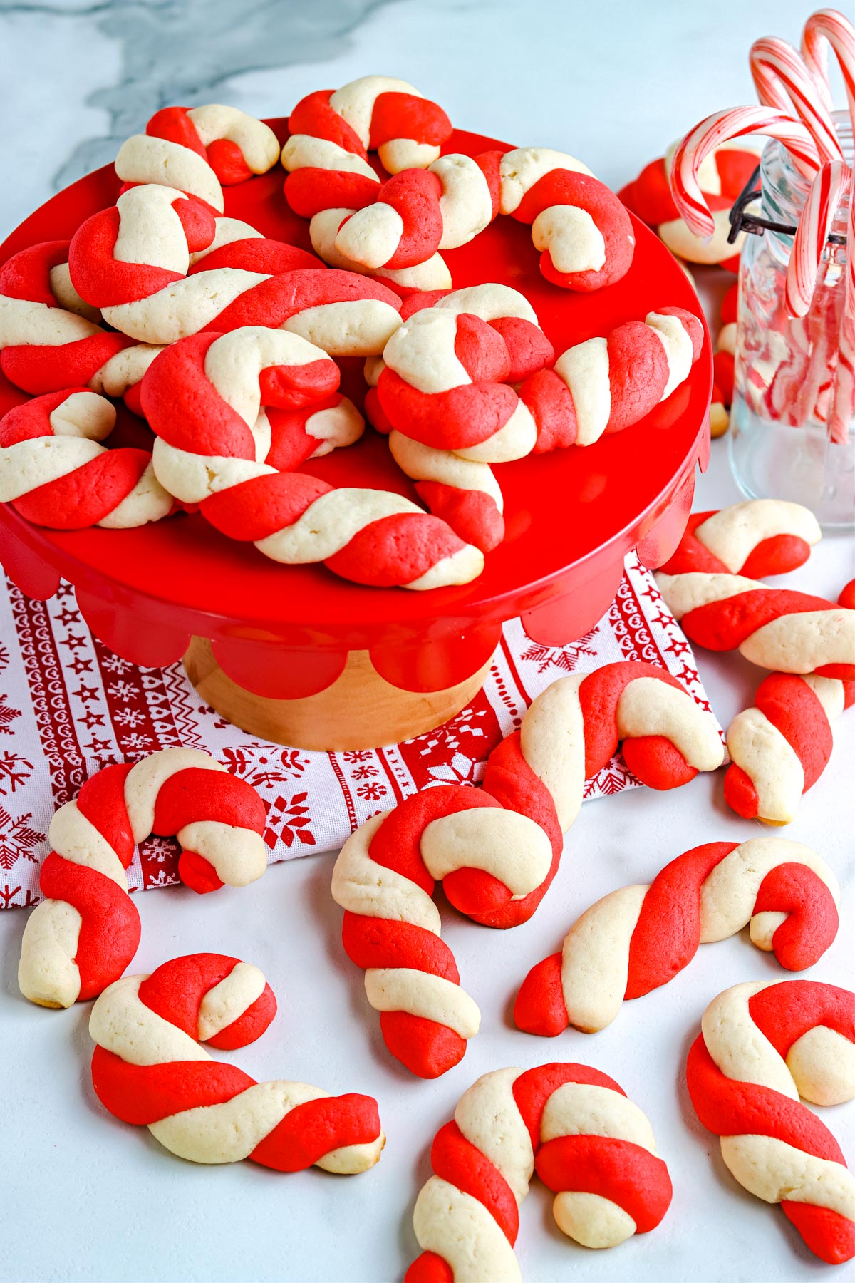 An overhead picture of the finished Candy Cane Cookie Recipe on a cake stand.